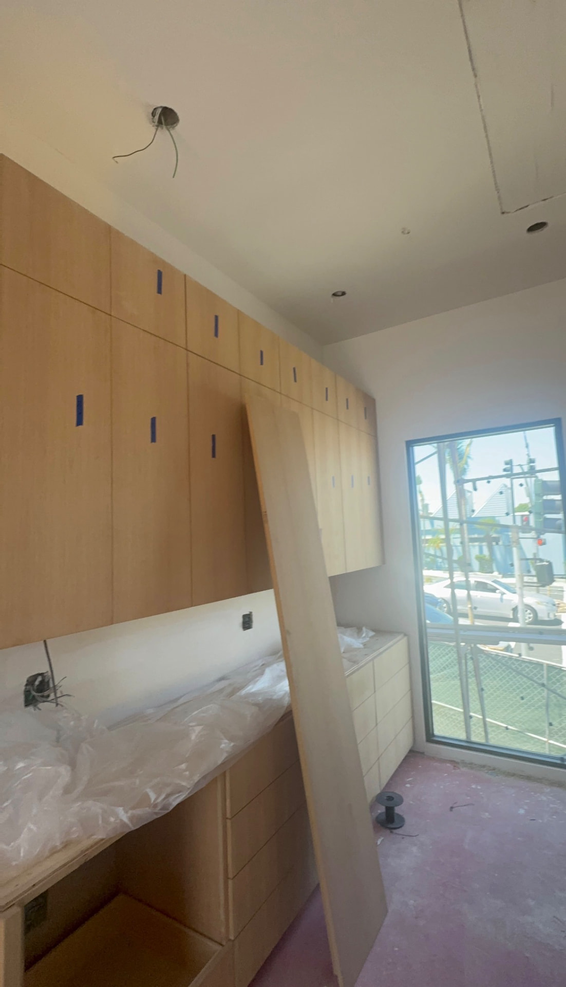 Floor-to-ceiling custom oak cabinetry install